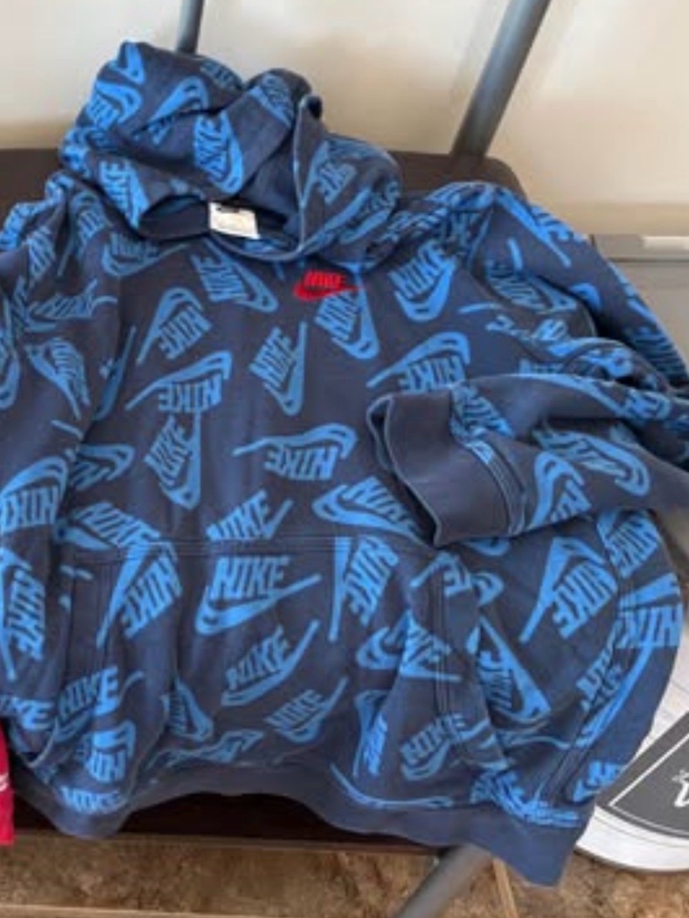 Nike Kids Navy Hoodie with Bright Blue Logo Print